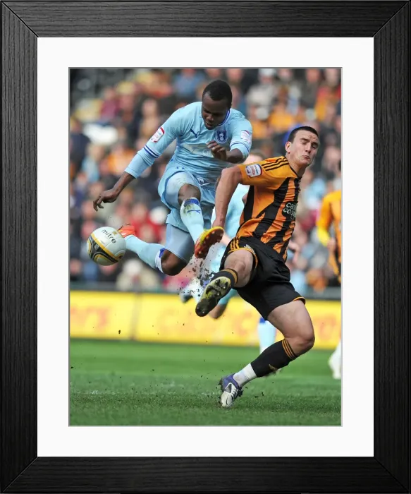 Framed Print : Battle for the Ball: Nimely vs. Hobbs in the Intense Npower Championship Clash Framed Print : Battle for the Ball: Nimely vs. Hobbs in the Intense Npower Championship Clash