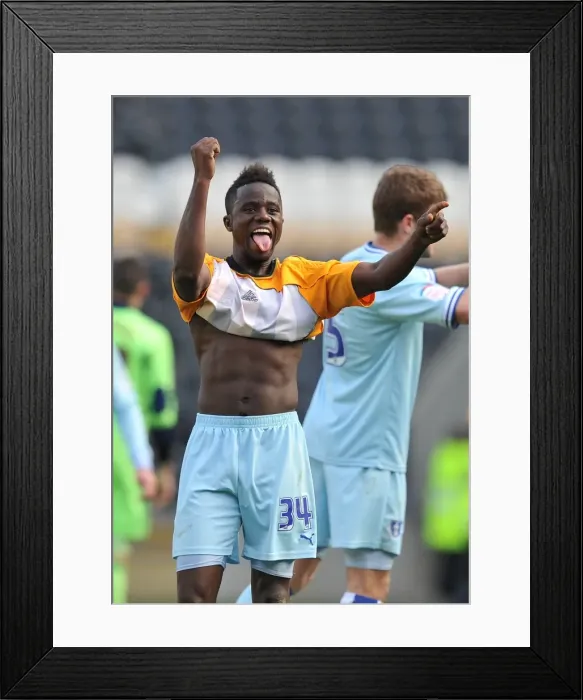 Framed Print : Coventry City's Gael Bigirimana: Championship Win Celebration vs. Hull City (March 31, 2012) Framed Print : Coventry City's Gael Bigirimana: Championship Win Celebration vs. Hull City (March 31, 2012)