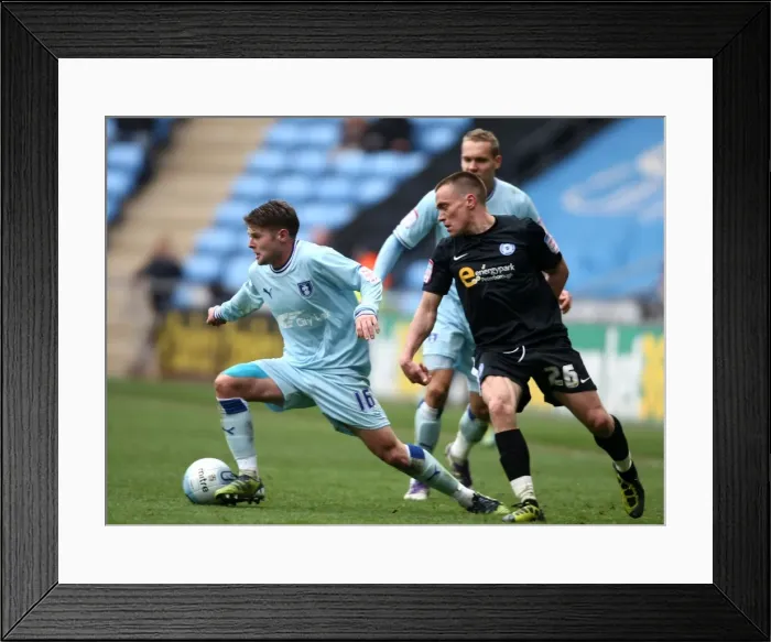 Framed Print : Showdown at Ricoh Arena: Coventry City vs. Peterborough United in the Npower Championship (07-04-2012) Framed Print : Showdown at Ricoh Arena: Coventry City vs. Peterborough United in the Npower Championship (07-04-2012)