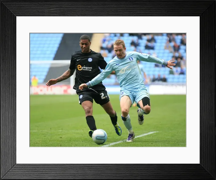 Framed Print : Intense Rivalry: McSheffrey vs. Little at the Ricoh Arena (Coventry City vs. Peterborough United, Npower Championship)