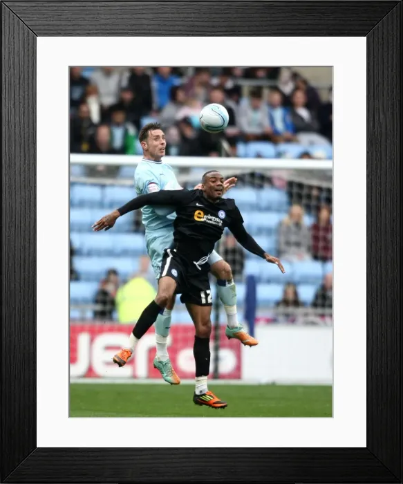 Framed Print : Championship Showdown: Keogh vs. Sinclair at Ricoh Arena - Coventry City vs. Peterborough United Framed Print : Championship Showdown: Keogh vs. Sinclair at Ricoh Arena - Coventry City vs. Peterborough United
