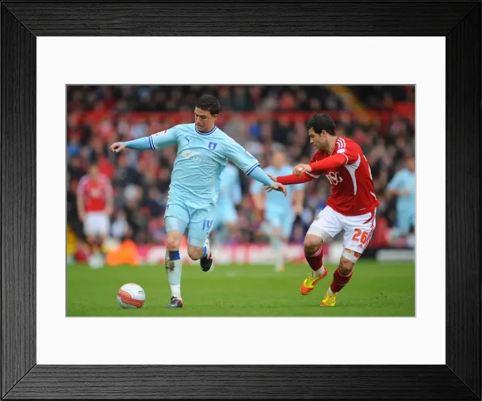 Framed Print : Cody McDonald Charges Forward Against Richard Foster: Coventry City vs. Bristol City, Npower Championship (09-04-2012) Framed Print : Cody McDonald Charges Forward Against Richard Foster: Coventry City vs. Bristol City, Npower Championship (09-04-2012)