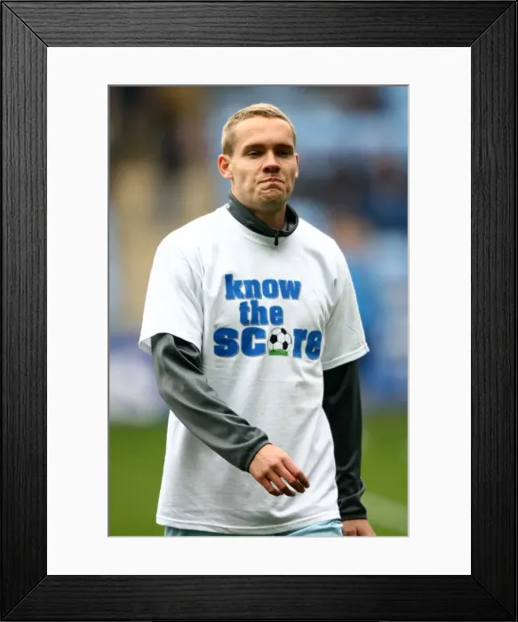 Framed Print : Chris Hussey's Pre-Match Warm-Up in Know the Score T-Shirt (Coventry City FC vs. Peterborough United, Npower Championship, Ricoh Arena, 07-04-2012) Framed Print : Chris Hussey's Pre-Match Warm-Up in Know the Score T-Shirt (Coventry City FC vs. Peterborough United, Npower Championship, Ricoh Arena, 07-04-2012)