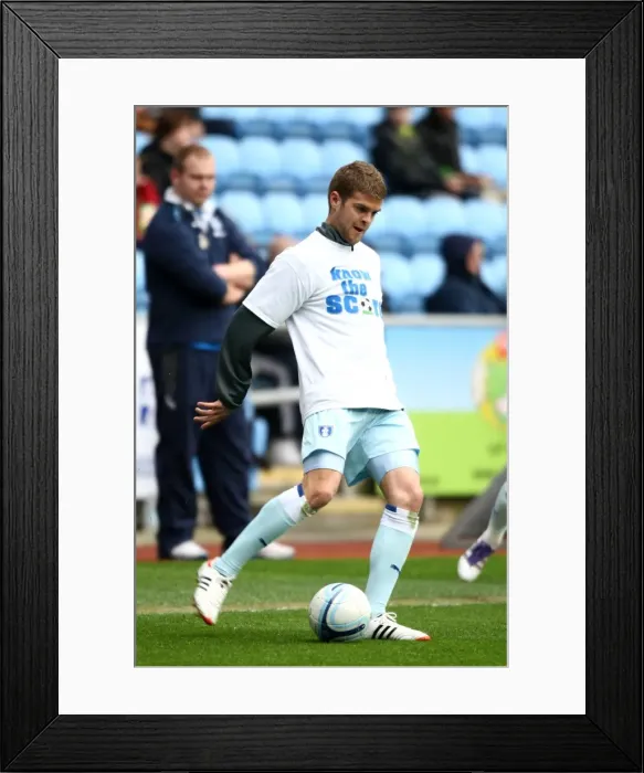 Framed Print : Martin Cranie Faces Off Against Peterborough United at Ricoh Arena (Npower Championship, 07-04-2012)