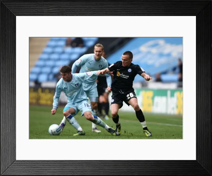 Framed Print : Battle for the Ball: Norwood vs. Taylor - Coventry City vs. Peterborough United, Npower Championship (07-04-2012)
