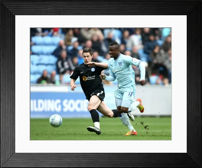 Framed Print : Charging Forward: Alex Nimely of Coventry City Against Peterborough United in Npower Championship (07-04-2012, Ricoh Arena)