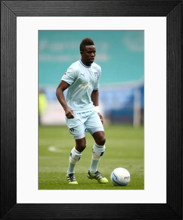 Framed Print : Gael Bigirimana in Action: Coventry City vs. Peterborough United, Npower Championship (07-04-2012, Ricoh Arena) Framed Print : Gael Bigirimana in Action: Coventry City vs. Peterborough United, Npower Championship (07-04-2012, Ricoh Arena)