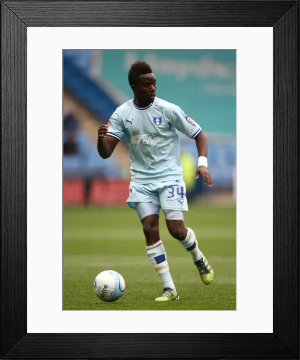 Framed Print : Gael Bigirimana in Action: Coventry City vs. Peterborough United, Npower Championship (07-04-2012, Ricoh Arena) Framed Print : Gael Bigirimana in Action: Coventry City vs. Peterborough United, Npower Championship (07-04-2012, Ricoh Arena)