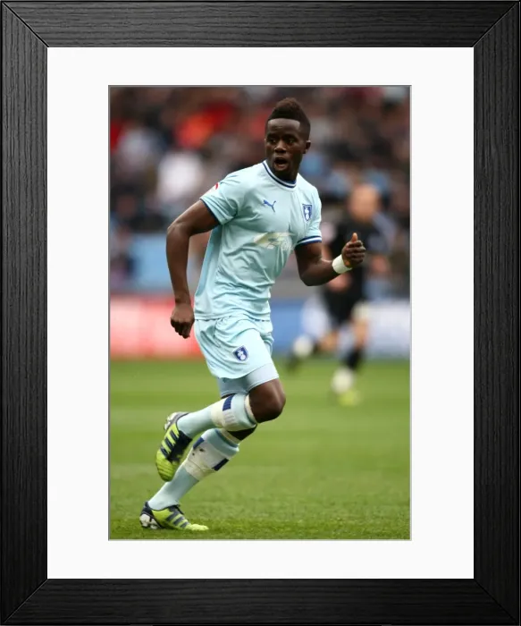Framed Print : Gael Bigirimana in Action: Coventry City vs. Peterborough United (07-04-2012, Ricoh Arena) Framed Print : Gael Bigirimana in Action: Coventry City vs. Peterborough United (07-04-2012, Ricoh Arena)