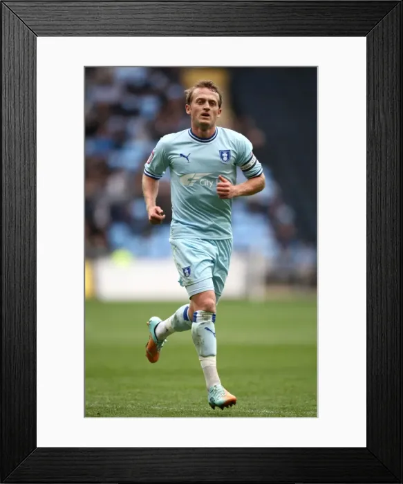Framed Print : Showdown at Ricoh Arena: Sammy Clingan Leads Coventry City Against Peterborough United (Npower Championship, 07-04-2012) Framed Print : Showdown at Ricoh Arena: Sammy Clingan Leads Coventry City Against Peterborough United (Npower Championship, 07-04-2012)