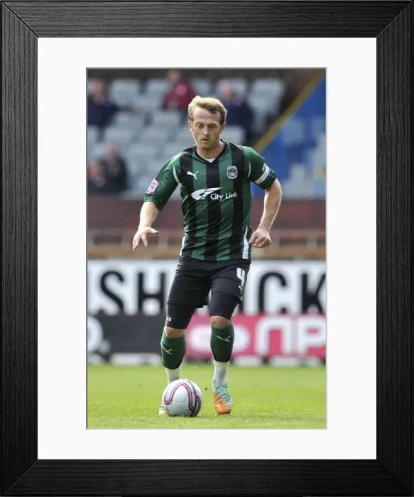 Framed Print : Sammy Clingan in Action: Coventry City vs Burnley, Npower Championship (April 14, 2012) Framed Print : Sammy Clingan in Action: Coventry City vs Burnley, Npower Championship (April 14, 2012)