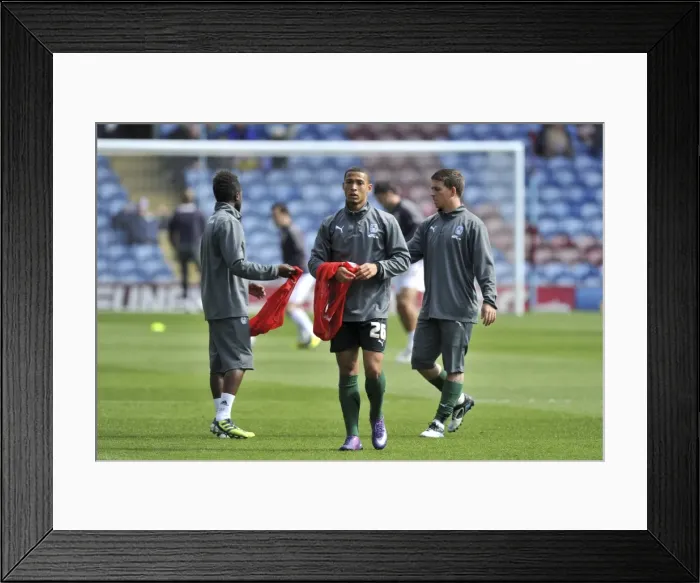 Framed Print : Jordan Clarke in Focus: Coventry City Star's Intense Warm-Up Ahead of Burnley Championship Clash (April 14, 2012) Framed Print : Jordan Clarke in Focus: Coventry City Star's Intense Warm-Up Ahead of Burnley Championship Clash (April 14, 2012)
