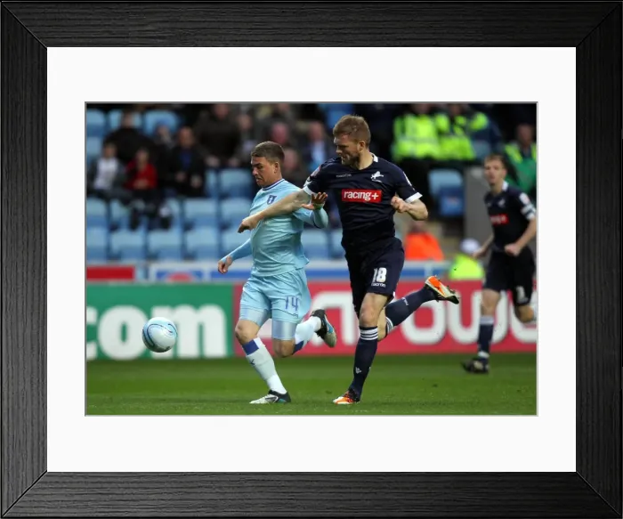 Framed Print : Cody McDonald vs Darren Ward: A Tight Tussle in Coventry City vs Millwall Npower Championship Match Framed Print : Cody McDonald vs Darren Ward: A Tight Tussle in Coventry City vs Millwall Npower Championship Match