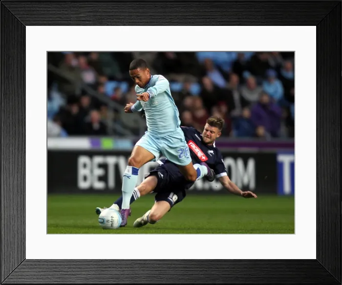 Framed Print : Clash at the Ricoh: Jordan Clarke vs. Scott Barron - Coventry City vs. Millwall Football Championship Encounter