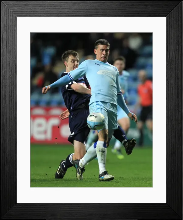 Framed Print : Intense Rivalry: Cody McDonald vs. Tony Craig Clash in Coventry City vs. Millwall (Npower Championship, 17-04-2012) Framed Print : Intense Rivalry: Cody McDonald vs. Tony Craig Clash in Coventry City vs. Millwall (Npower Championship, 17-04-2012)