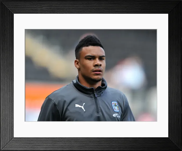Framed Print : Jordan Willis vs Hull City: Intense Face-Off at KC Stadium (Championship Match, March 31, 2012)