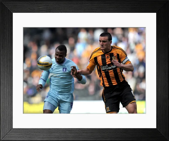 Framed Print : Battle for the Ball: Tchuimeni-Nimely vs. Hobbs at KC Stadium (Coventry City vs. Hull City, Npower Football League Championship, 31-03-2012) Framed Print : Battle for the Ball: Tchuimeni-Nimely vs. Hobbs at KC Stadium (Coventry City vs. Hull City, Npower Football League Championship, 31-03-2012)
