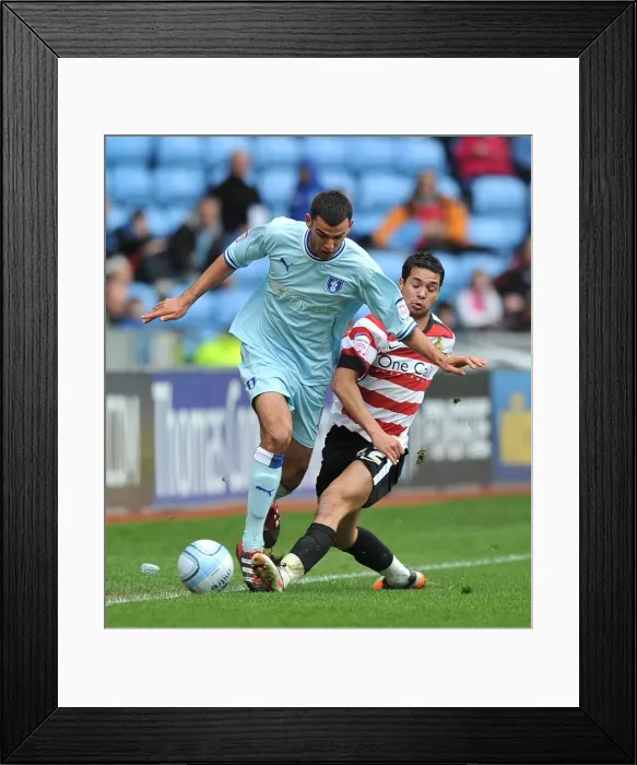 Framed Print : Intense Battle: Conor Thomas vs Fabien Robert in Coventry City vs Doncaster Rovers Championship Clash (April 2012) Framed Print : Intense Battle: Conor Thomas vs Fabien Robert in Coventry City vs Doncaster Rovers Championship Clash (April 2012)