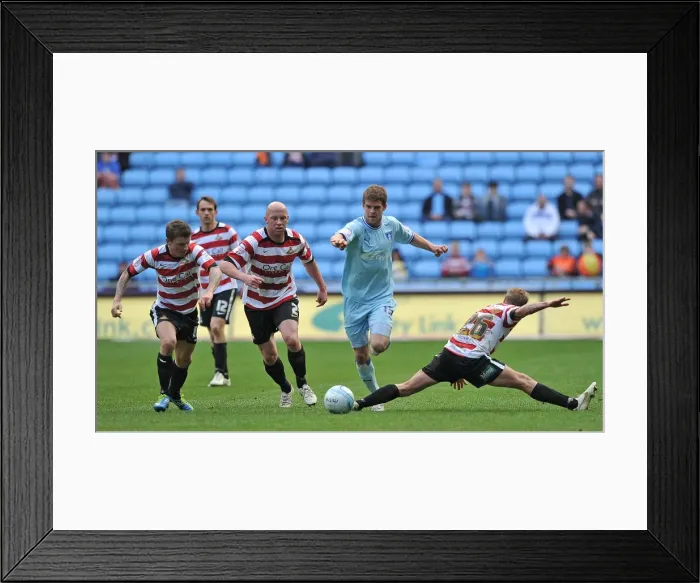Framed Print : Martin Cranie's Determined Attack: Coventry City vs Doncaster Rovers (Npower Championship, 21-04-2012, Ricoh Arena) Framed Print : Martin Cranie's Determined Attack: Coventry City vs Doncaster Rovers (Npower Championship, 21-04-2012, Ricoh Arena)