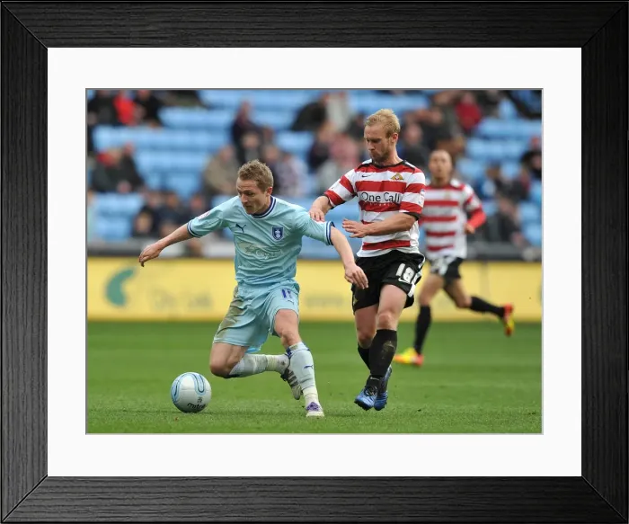 Framed Print : McSheffrey vs. Gillett: A Football Battle at the Ricoh Arena - Coventry City vs. Doncaster Rovers, Npower Championship (21-04-2012)