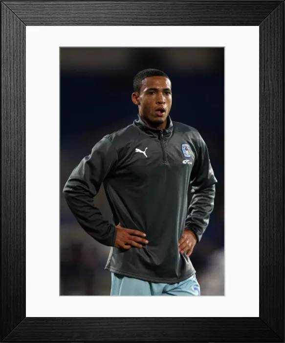 Framed Print : Jordan Clarke vs. Cardiff City: A Fierce Npower Championship Showdown (Mar. 2012)