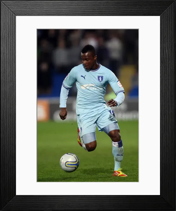 Framed Print : Alex Nimely Faces Off Against Cardiff City at Npower Championship (21-03-2012)