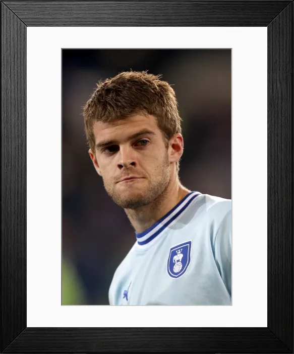 Framed Print : Showdown at Cardiff City Stadium: Coventry City vs Cardiff City (21-03-2012) - Martin Cranie's Determined Performance Framed Print : Showdown at Cardiff City Stadium: Coventry City vs Cardiff City (21-03-2012) - Martin Cranie's Determined Performance