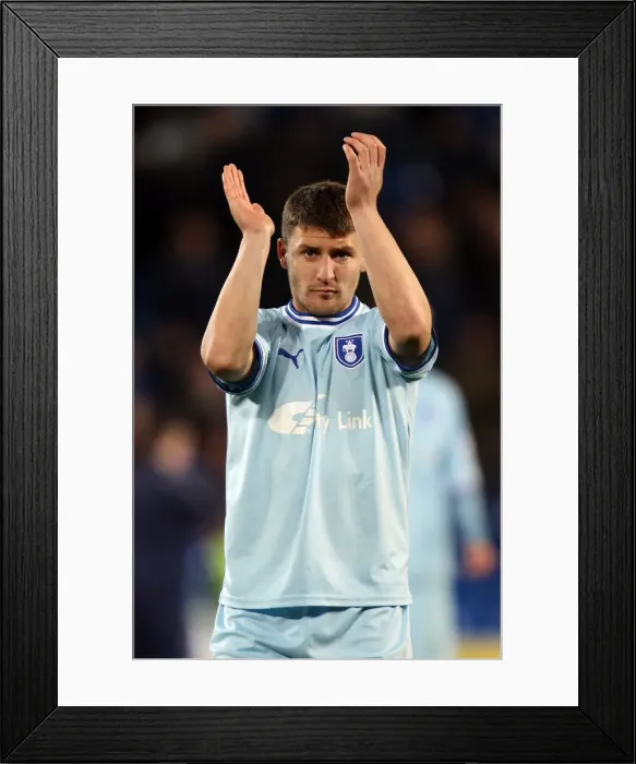 Framed Print : Gary Deegan vs. Cardiff City: A Fierce Face-Off in the Npower Championship (21-03-2012) Framed Print : Gary Deegan vs. Cardiff City: A Fierce Face-Off in the Npower Championship (21-03-2012)