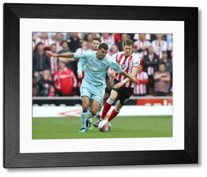Framed Print : Conor Thomas Evades Dean Hammond: Coventry City vs Southampton Championship Clash (2012) Framed Print : Conor Thomas Evades Dean Hammond: Coventry City vs Southampton Championship Clash (2012)