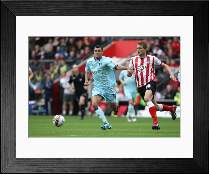 Framed Print : Conor Thomas vs. Jos Hooiveld: A Championship Showdown of Power and Control at St. Mary's (April 2012) Framed Print : Conor Thomas vs. Jos Hooiveld: A Championship Showdown of Power and Control at St. Mary's (April 2012)