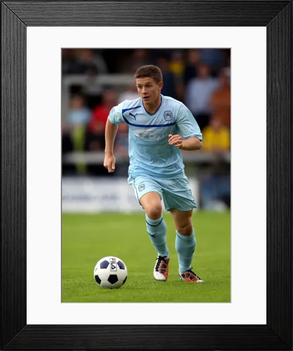 Framed Print : Coventry City's Garon Phillips in Action at De Montfort Park: Pre-Season Friendly vs Hinckley United Framed Print : Coventry City's Garon Phillips in Action at De Montfort Park: Pre-Season Friendly vs Hinckley United