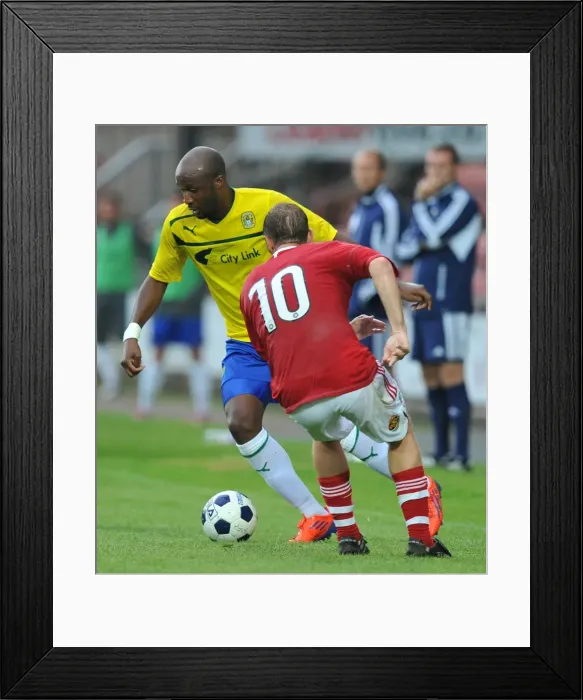 Framed Print : Edjenguele Overpowers Ormerod: Coventry City's Pre-Season Battle at Wrexham's Racecourse Ground Framed Print : Edjenguele Overpowers Ormerod: Coventry City's Pre-Season Battle at Wrexham's Racecourse Ground