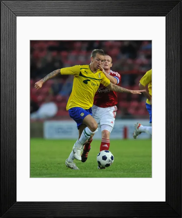 Framed Print : Carl Baker's Pre-Season Strike: Coventry City vs Wrexham at The Racecourse Ground Framed Print : Carl Baker's Pre-Season Strike: Coventry City vs Wrexham at The Racecourse Ground