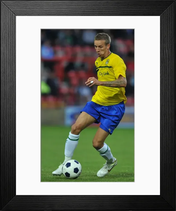 Framed Print : Carl Baker in Action: Coventry City vs Wrexham Pre-Season Friendly at The Racecourse Ground