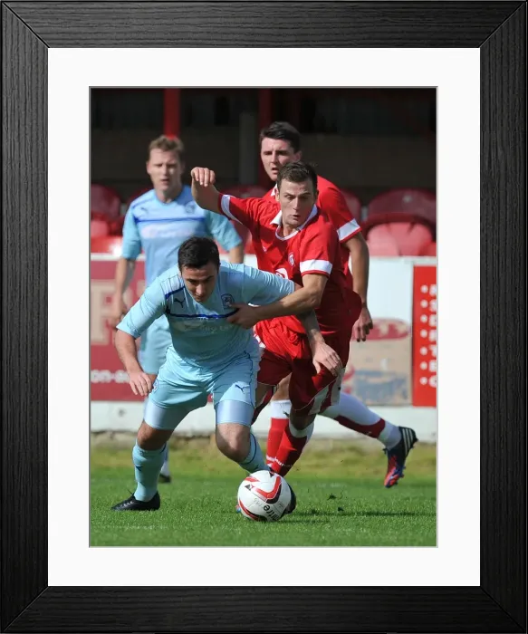 Framed Print : Coventry City's Roy O'Donovan Fouled in Pre-Season Friendly Against Accrington Stanley Framed Print : Coventry City's Roy O'Donovan Fouled in Pre-Season Friendly Against Accrington Stanley