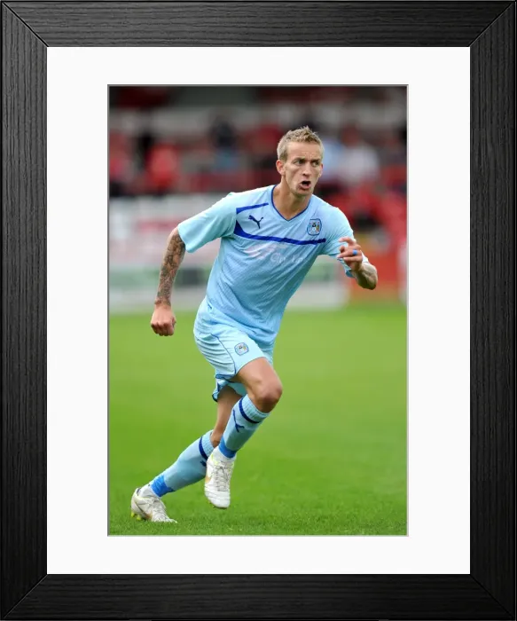 Framed Print : Carl Baker in Action: Coventry City's Pre-Season Friendly at Accrington Stanley's Crown Ground Framed Print : Carl Baker in Action: Coventry City's Pre-Season Friendly at Accrington Stanley's Crown Ground