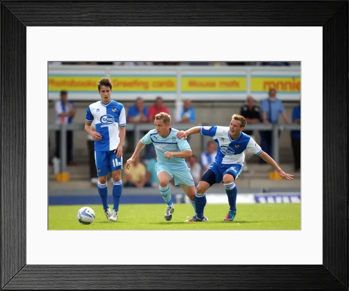 Framed Print : McSheffrey vs. Clucas: A Battle for the Ball in Coventry City's Pre-Season Clash with Bristol Rovers Framed Print : McSheffrey vs. Clucas: A Battle for the Ball in Coventry City's Pre-Season Clash with Bristol Rovers