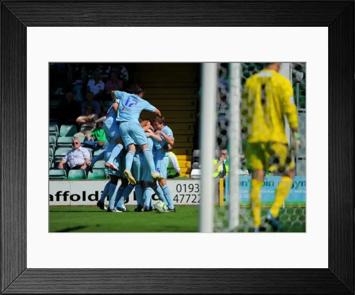 Framed Print : Cody McDonald's Game-Winning Goal: Coventry City Celebrates at Huish Park Framed Print : Cody McDonald's Game-Winning Goal: Coventry City Celebrates at Huish Park