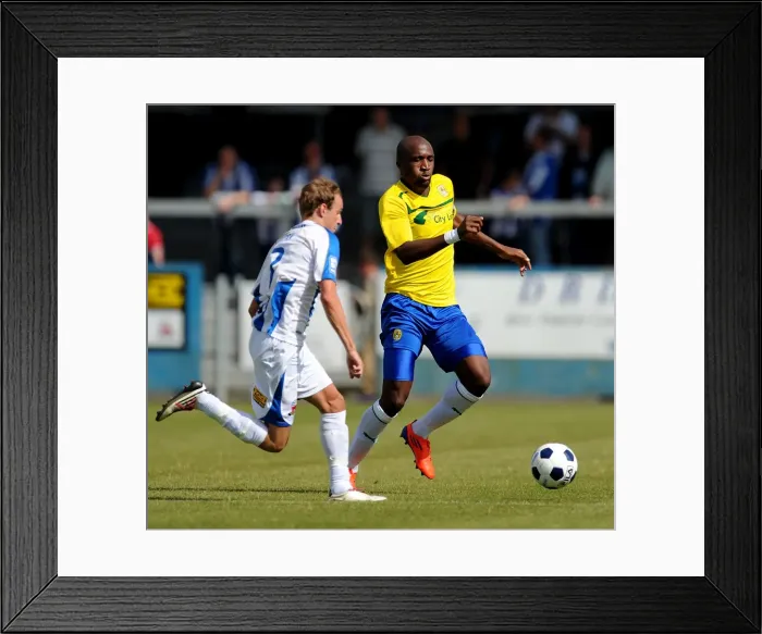 Framed Print : Clash at Liberty Way: A Battle Between Nuneaton Town's Sleath and Coventry City's Edjenguele