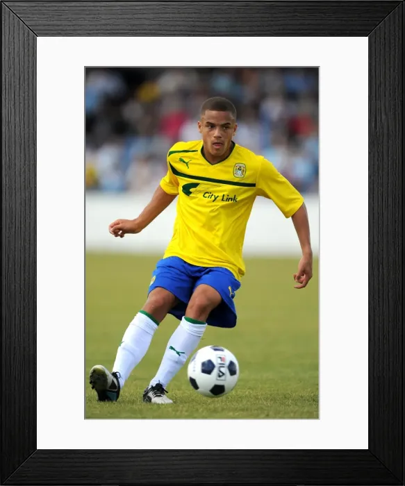 Framed Print : Lewis Garner in Action: Coventry City FC vs Nuneaton Town - Pre-Season Friendly at Liberty Way Stadium