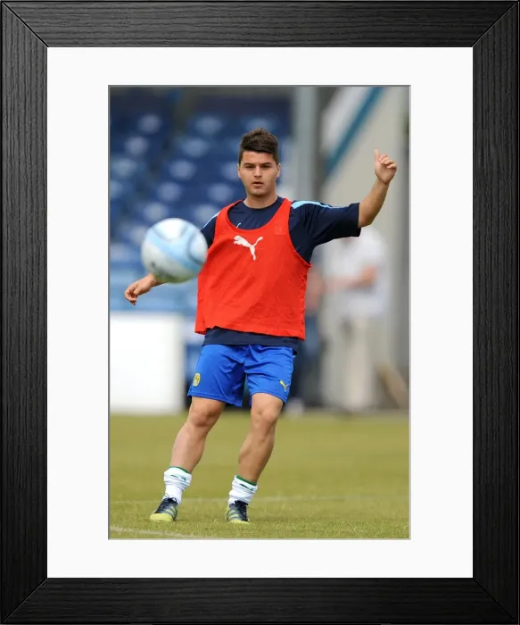 Framed Print : Coventry City's Ndriqim Halili in Action during Pre-Season Battle at Nuneaton Town