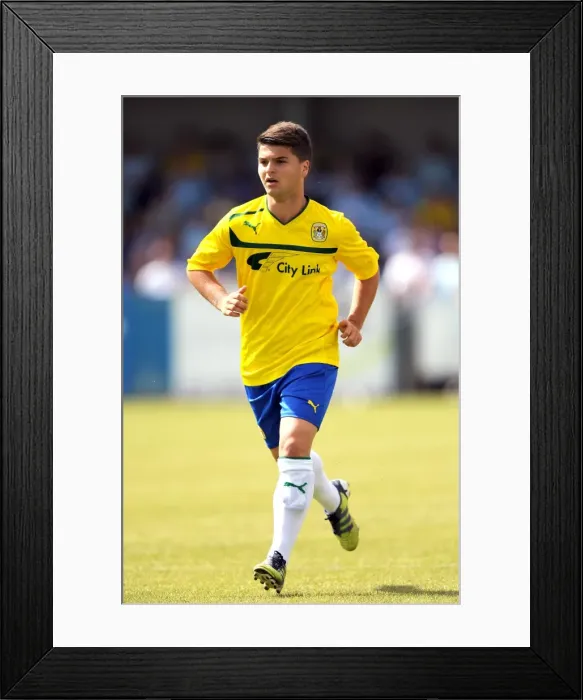 Framed Print : Coventry City's Ndriqim Halili in Action: A Pre-Season Thriller at Nuneaton Town's Liberty Way Stadium