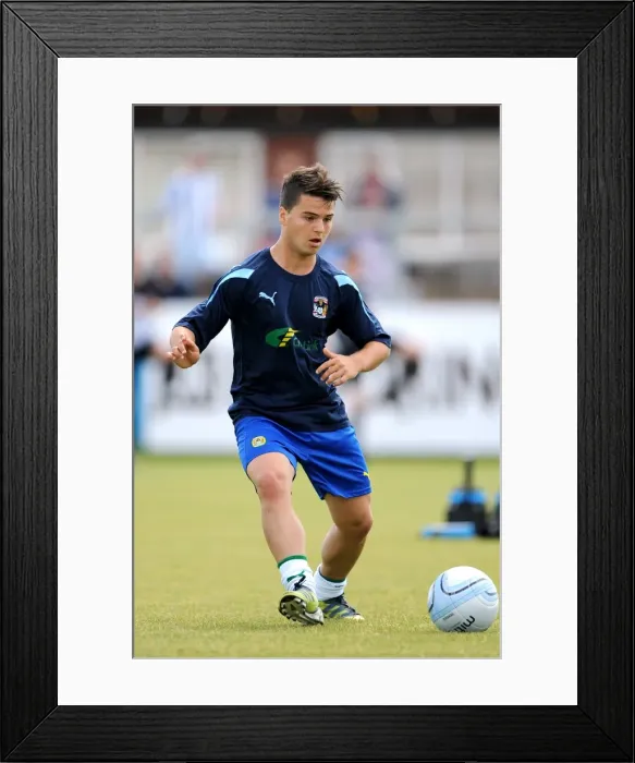 Framed Print : Coventry City's Ndriqim Halili Shines in Pre-Season Victory over Nuneaton Town at Liberty Way Stadium