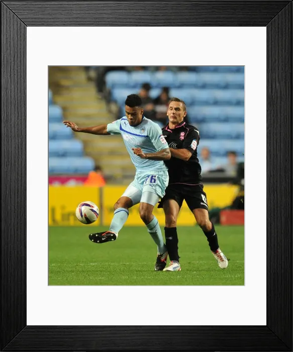 Framed Print : Battling for Supremacy: Coventry City vs Birmingham City in the Capital One Cup Framed Print : Battling for Supremacy: Coventry City vs Birmingham City in the Capital One Cup