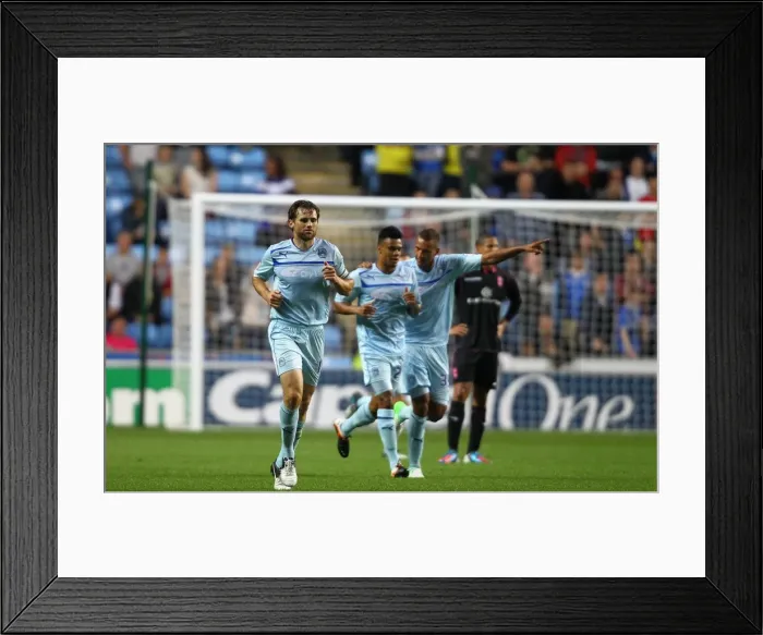 Framed Print : Coventry City FC's Double Strike: Kevin Kilbane Celebrates Against Birmingham City in Capital One Cup (28-08-2012)