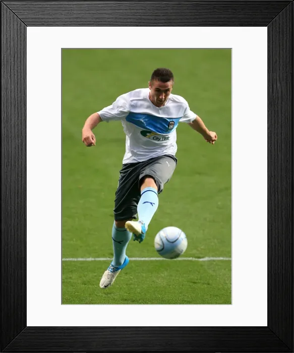 Framed Print : Coventry City vs Burton Albion: Johnstones Paint Trophy Northern Section - Coventry City's Callum Ball Warming Up at Ricoh Arena Framed Print : Coventry City vs Burton Albion: Johnstones Paint Trophy Northern Section - Coventry City's Callum Ball Warming Up at Ricoh Arena