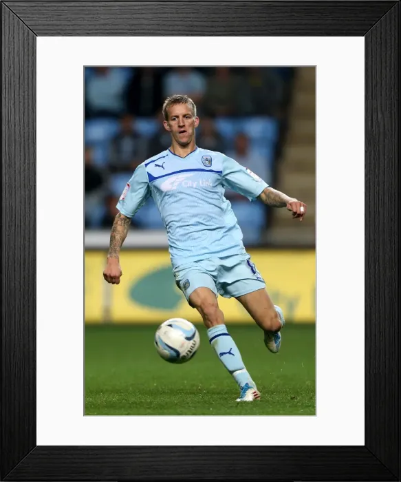 Framed Print : Carl Baker in Action: Coventry City vs Burton Albion, Johnstones Paint Trophy Northern Section (September 4, 2012) Framed Print : Carl Baker in Action: Coventry City vs Burton Albion, Johnstones Paint Trophy Northern Section (September 4, 2012)