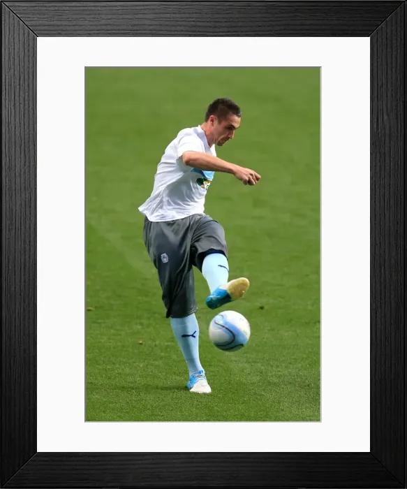Framed Print : Johnstones Paint Trophy: Coventry City vs Burton Albion - Callum Ball's Focused Warm-Up at Ricoh Arena