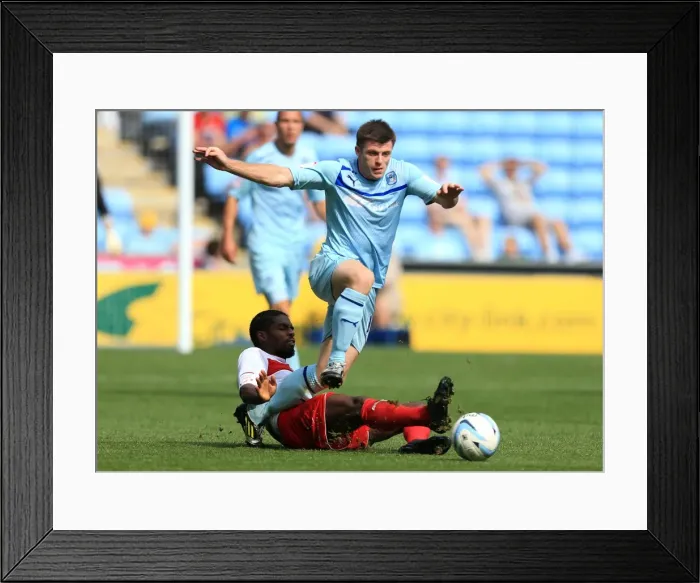 Framed Print : Intense Rivalry: Coventry City vs Stevenage in Npower League One at Ricoh Arena