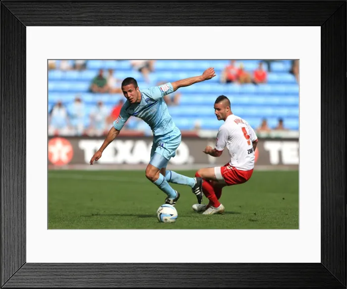 Framed Print : Wood vs Haber: Coventry City vs Stevenage Clash in Npower League One at Ricoh Arena